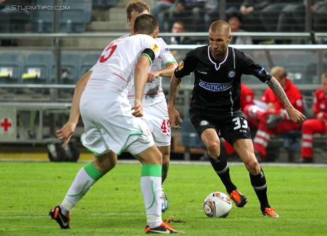 Sturm-Lok Moskau
UEFA Europa League Gruppenphase 1. Spieltag,  SK Sturm Graz - FC Lokomotiv Moskau, Stadion Liebenau, 15.9.2011. 

Foto zeigt Taras Burlak (Lok Moskau), Roman Shishkin (Lok Moskau) und Patrick Wolf (Sturm)
