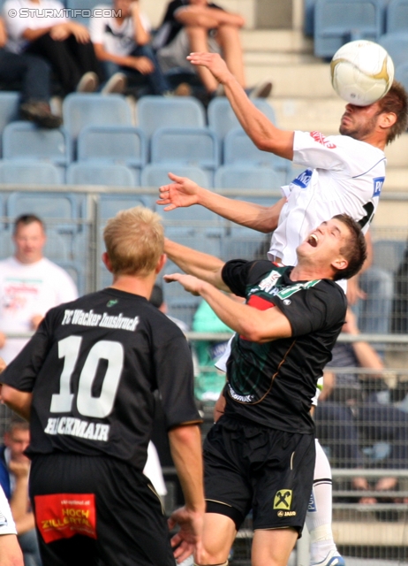 Sturm Graz - Innsbruck
Oesterreichische Fussball Bundesliga, 8. Runde,  SK Sturm Graz - FC Wacker Innsbruck, Stadion Liebenau Graz, 18.9.2011. 

Foto zeigt Peter Hackmair (Innsbruck) und Martin Ehrenreich (Sturm)
Schlüsselwörter: kopfball