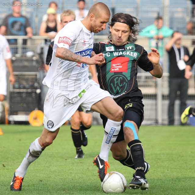 Sturm Graz - Innsbruck
Oesterreichische Fussball Bundesliga, 8. Runde,  SK Sturm Graz - FC Wacker Innsbruck, Stadion Liebenau Graz, 18.9.2011. 

Foto zeigt Patrick Wolf (Sturm) und Tomas Abraham (Innsbruck)
