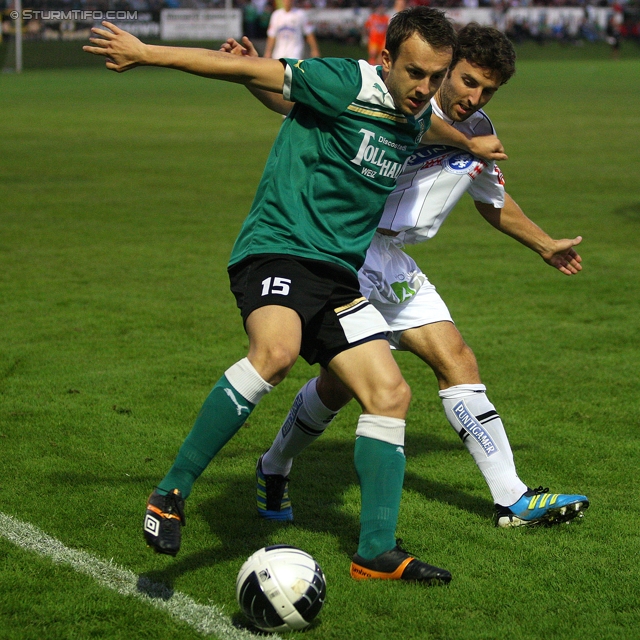 Weiz - Sturm Graz
OEFB Cup, 2. Runde,  SC Weiz - SK Sturm Graz, Stadion Weiz, 21.9.2011. 

Foto zeigt Mladen Stipkovic (Weiz) und Joachim Standfest (Sturm)
