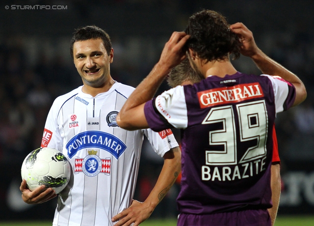 Austria Wien - Sturm Graz
Oesterreichische Fussball Bundesliga, 9. Runde,  FK Austria Wien - SK Sturm Graz, Franz-Horr-Stadion, 24.9.2011. 

Foto zeigt Darko Bodul (Sturm) und Nacer Barazite (Austria)
