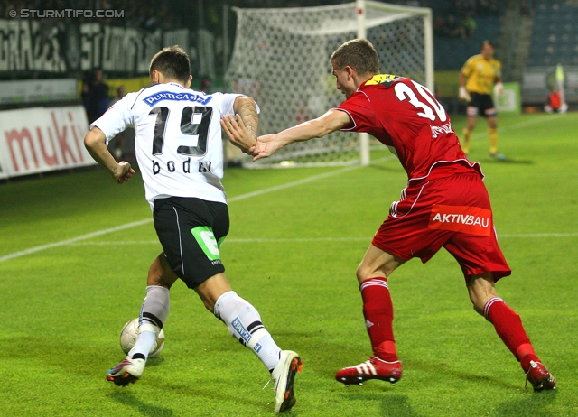 Sturm Graz - Ried
Oesterreichische Fussball Bundesliga, 10. Runde,  SK Sturm Graz - SV Ried, Stadion Liebenau Graz, 2.10.2011. 

Foto zeigt Darko Bodul (Sturm) und Lukas Rotpuller (Ried)
