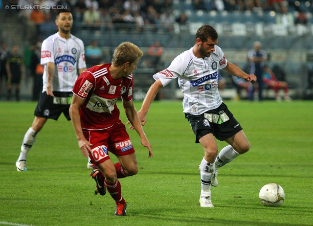 Sturm Graz - Ried
Oesterreichische Fussball Bundesliga, 10. Runde,  SK Sturm Graz - SV Ried, Stadion Liebenau Graz, 2.10.2011. 

Foto zeigt Juergen Saeumel (Sturm) und Darko Bodul (Sturm)
