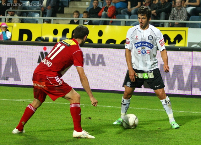 Sturm Graz - Ried
Oesterreichische Fussball Bundesliga, 10. Runde,  SK Sturm Graz - SV Ried, Stadion Liebenau Graz, 2.10.2011. 

Foto zeigt Giorgi Popkhadze (Sturm) und Ignacio Rodriguez-Ortiz (Ried)
