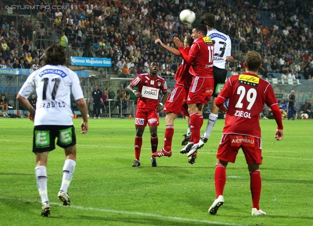 Sturm Graz - Ried
Oesterreichische Fussball Bundesliga, 10. Runde,  SK Sturm Graz - SV Ried, Stadion Liebenau Graz, 2.10.2011. 

Foto zeigt Imre Szabics (Sturm) und Ignacio Diaz-Casanova Montenegro (Ried) und Thomas Burgstaller (Sturm) und Marcel Ziegl (Ried)
