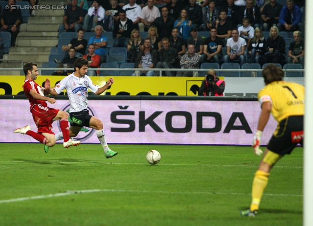 Sturm Graz - Ried
Oesterreichische Fussball Bundesliga, 10. Runde,  SK Sturm Graz - SV Ried, Stadion Liebenau Graz, 2.10.2011. 

Foto zeigt Giorgi Popkhadze (Sturm) und Thomas Gebauer (Ried)
