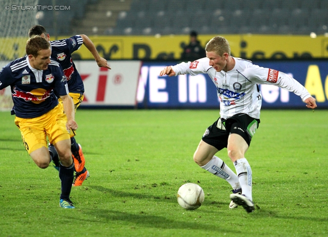 Sturm Graz - RB Salzburg
Oesterreichische Fussball Bundesliga, 12. Runde,  SK Sturm Graz - RB Salzburg, Stadion Liebenau Graz, 23.10.2011. 

Foto zeigt Christian Schwegler (Salzburg) und Florian Kainz (Sturm)
