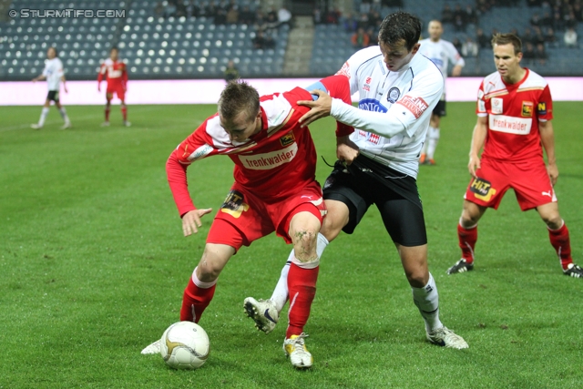 Sturm Graz - Admira
OEFB Cup, Achtelfinale,  SK Sturm Graz -  FC Admira, Stadion Liebenau Graz, 26.10.2011. 

Foto zeigt Christopher Dibon (Admira) und Haris Bukva (Sturm)
