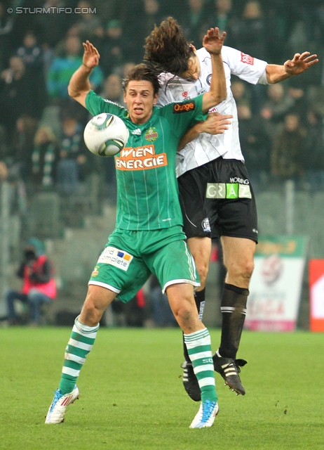 Rapid - Sturm Graz
Oesterreichische Fussball Bundesliga, 13. Runde,  SK Rapid Wien - SK Sturm Graz, Gerhard Hanappi Stadion Wien, 29.10.2011. 

Foto zeigt Rene Gartler (Rapid) und Thomas Burgstaller (Sturm)
Schlüsselwörter: kopfball