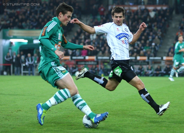 Rapid - Sturm Graz
Oesterreichische Fussball Bundesliga, 13. Runde,  SK Rapid Wien - SK Sturm Graz, Gerhard Hanappi Stadion Wien, 29.10.2011. 

Foto zeigt Christopher Drazan (Rapid) und Giorgi Popkhadze (Sturm)
