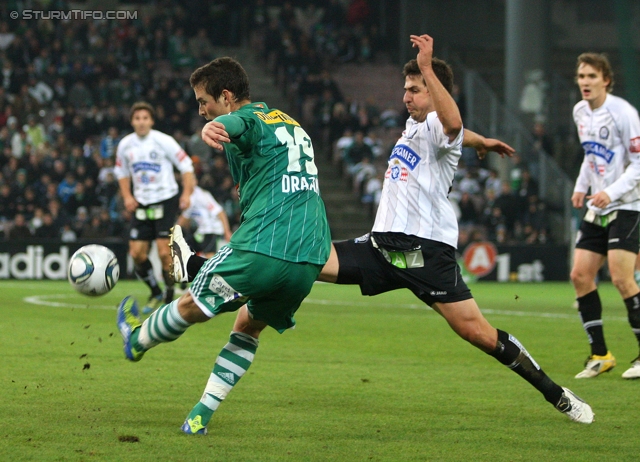 Rapid - Sturm Graz
Oesterreichische Fussball Bundesliga, 13. Runde,  SK Rapid Wien - SK Sturm Graz, Gerhard Hanappi Stadion Wien, 29.10.2011. 

Foto zeigt Christopher Drazan (Rapid) und Giorgi Popkhadze (Sturm)
