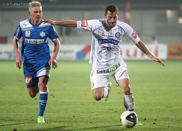 Wr. Neustadt - Sturm Graz
Oesterreichische Fussball Bundesliga, 15. Runde,  SC Wiener Neustadt - SK Sturm Graz, Stadion Wiener Neustadt, 19.11.2011. 

Foto zeigt Juergen Saeumel (Sturm)
