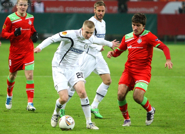 Lok Moskau - Sturm Graz
UEFA Europa League Gruppenphase 5. Spieltag, FC Lokomotiv Moskau - SK Sturm Graz, Lokomotiv Stadion Moskau, 1.12.2011. 

Foto zeigt Matthias Koch (Sturm) und Alberto Zapater (Lok Moskau)
