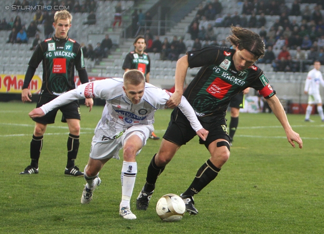 Innsbruck - Sturm Graz
Oesterreichische Fussball Bundesliga, 17. Runde, FC Wacker Innsbruck - SK Sturm Graz, Tivoli Neu Innsbruck, 4.12.2011. 

Foto zeigt Matthias Koch (Sturm) und Tomas Abraham (Innsbruck)
