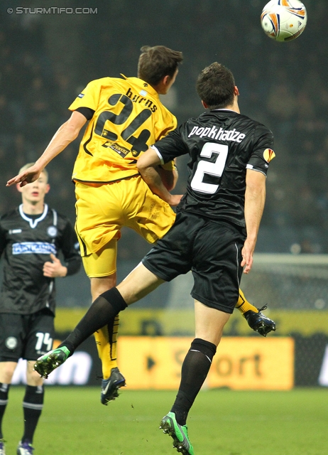 Sturm Graz - AEK Athen
UEFA Europa League Gruppenphase 6. Spieltag, SK Sturm Graz - AEK Athen, Stadion Liebenau Graz, 14.12.2011. 

Foto zeigt Nathan Burns (AEK Athen) und Giorgi Popkhadze (Sturm)
Schlüsselwörter: kopfball