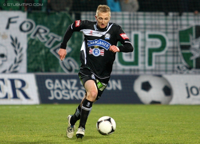 Ried - Sturm Graz
Oesterreichische Fussball Bundesliga, 19. Runde,  SV Ried - SK Sturm Graz, Arena Ried, 17.12.2011. 

Foto zeigt Matthias Koch (Sturm)
