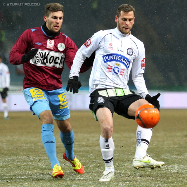 Sturm Graz - Mattersburg
Oesterreichische Fussball Bundesliga, 20. Runde,  SK Sturm Graz - SV Mattersburg, Stadion Liebenau Graz, 11.02.2012. 

Foto zeigt Manuel Seidl (Mattersburg) und Juergen Saeumel (Sturm)
