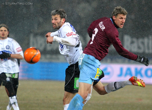 Sturm Graz - Mattersburg
Oesterreichische Fussball Bundesliga, 20. Runde,  SK Sturm Graz - SV Mattersburg, Stadion Liebenau Graz, 11.02.2012. 

Foto zeigt Srdjan Pavlov (Sturm) und Alois Hoeller (Mattersburg)
