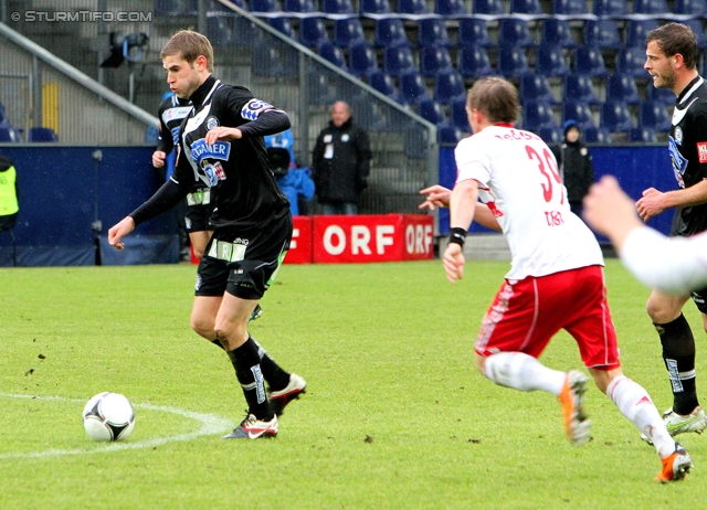 Salzburg - Sturm Graz
Oesterreichische Fussball Bundesliga, 21. Runde,  RB Salzburg - SK Sturm Graz, Stadion Wals-Siezenheim, 19.02.2012. 

Foto zeigt Andreas Hoelzl (Sturm) und Georg Teigl (Salzburg)
