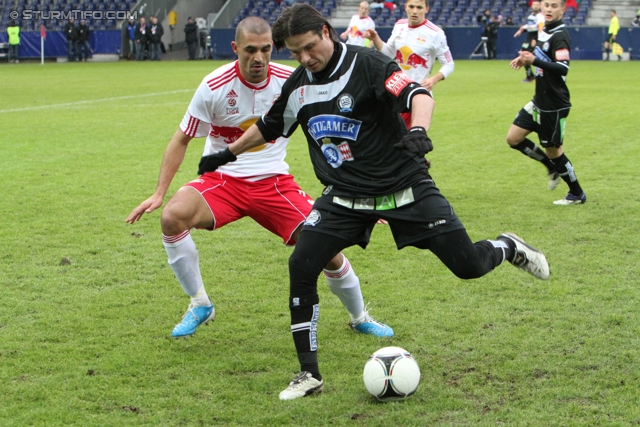 Salzburg - Sturm Graz
Oesterreichische Fussball Bundesliga, 21. Runde,  RB Salzburg - SK Sturm Graz, Stadion Wals-Siezenheim, 19.02.2012. 

Foto zeigt Leonardo Vitor Santiago (Salzburg) und Imre Szabics (Sturm)
