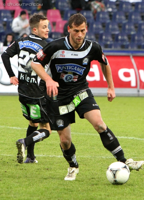 Salzburg - Sturm Graz
Oesterreichische Fussball Bundesliga, 21. Runde,  RB Salzburg - SK Sturm Graz, Stadion Wals-Siezenheim, 19.02.2012. 

Foto zeigt Christian Klem (Sturm) und Juergen Saeumel (Sturm)
