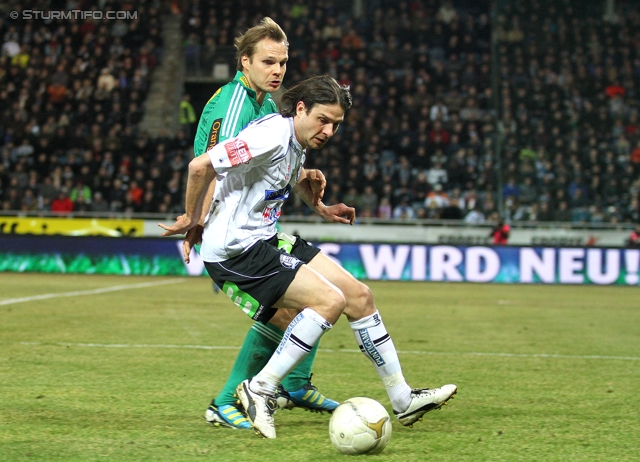 Sturm Graz - Rapid
Oesterreichische Fussball Bundesliga, 22. Runde, SK Sturm Graz - SK Rapid Wien, Stadion Liebenau Graz, 25.02.2012. 

Foto zeigt Imre Szabics (Sturm) und Markus Heikkinen (Rapid)
