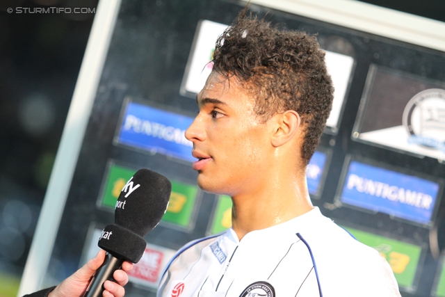 Sturm Graz - Rapid
Oesterreichische Fussball Bundesliga, 22. Runde, SK Sturm Graz - SK Rapid Wien, Stadion Liebenau Graz, 25.02.2012. 

Foto zeigt Rubin Rafael Okotie (Sturm) beim Interview
