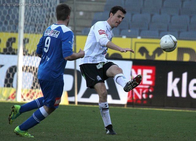 Sturm Graz - Wr. Neustadt
Oesterreichische Fussball Bundesliga, 24. Runde, SK Sturm Graz - SC Wiener Neustadt, Stadion Liebenau Graz, 10.3.2012. 

Foto zeigt Thomas Helly (Wr. Neustadt) und Thomas Burgstaller (Sturm)
