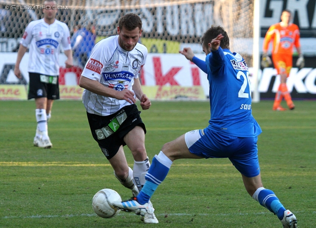 Sturm Graz - Wr. Neustadt
Oesterreichische Fussball Bundesliga, 24. Runde, SK Sturm Graz - SC Wiener Neustadt, Stadion Liebenau Graz, 10.3.2012. 

Foto zeigt Juergen Saeumel (Sturm) und Daniel Wolf (Wr. Neustadt)
