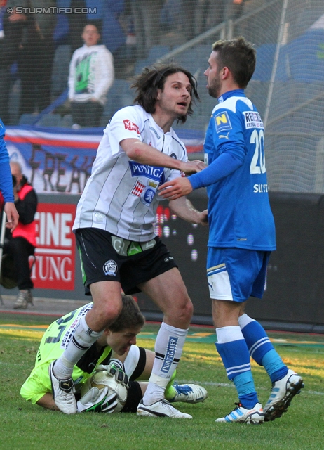 Sturm Graz - Wr. Neustadt
Oesterreichische Fussball Bundesliga, 24. Runde, SK Sturm Graz - SC Wiener Neustadt, Stadion Liebenau Graz, 10.3.2012. 

Foto zeigt Imre Szabics (Sturm) und Christoph Saurer (Wr. Neustadt)
