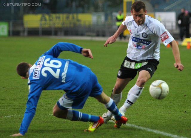 Sturm Graz - Wr. Neustadt
Oesterreichische Fussball Bundesliga, 24. Runde, SK Sturm Graz - SC Wiener Neustadt, Stadion Liebenau Graz, 10.3.2012. 

Foto zeigt Mario Pollhammer (Wr. Neustadt) und Juergen Saeumel (Sturm)
