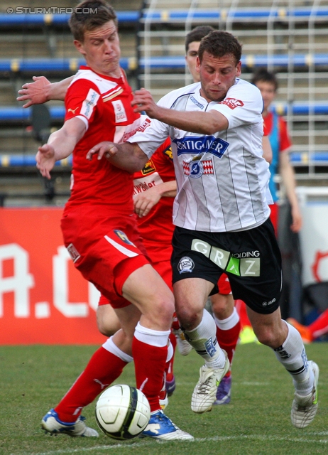 Admira - Sturm Graz
Oesterreichische Fussball Bundesliga, 25. Runde, FC Admira - SK Sturm Graz, Stadion Suedstadt Maria Enzersdorf, 18.3.2012. 

Foto zeigt Gernot Plassnegger (Admira) und Juergen Saeumel (Sturm)
