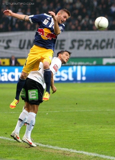 Sturm Graz - Salzburg
Oesterreichische Fussball Bundesliga, 30. Runde,  SK Sturm Graz - RB Salzburg, Stadion Liebenau Graz, 14.04.2012. 

Foto zeigt Jakob Jantscher (Salzburg) und Haris Bukva (Sturm)
Schlüsselwörter: kopfball