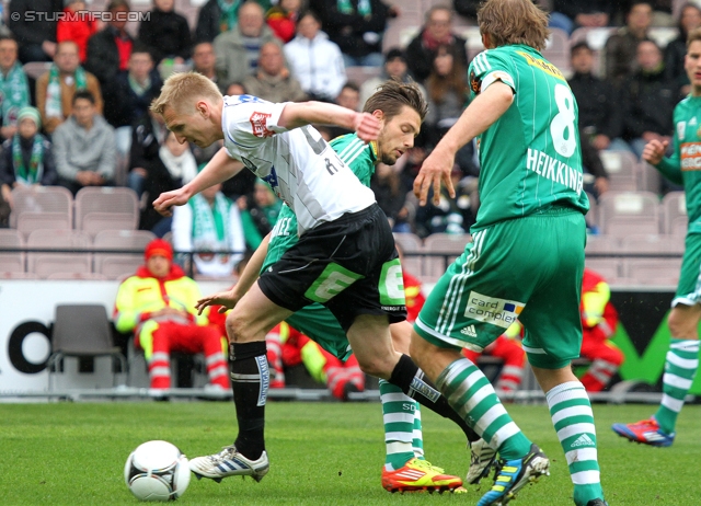 Rapid Wien - Sturm Graz
Oesterreichische Fussball Bundesliga, 31. Runde,  SK Rapid Wien - SK Sturm Graz, Gerhard Hanappi Stadion Wien, 22.04.2012. 

Foto zeigt Matthias Koch (Sturm) und Markus Heikkinen (Rapid)
