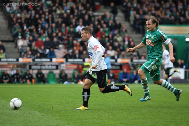 Rapid Wien - Sturm Graz
Oesterreichische Fussball Bundesliga, 31. Runde,  SK Rapid Wien - SK Sturm Graz, Gerhard Hanappi Stadion Wien, 22.04.2012. 

Foto zeigt Christoph Kroepfl (Sturm) und Markus Heikkinen (Rapid)
