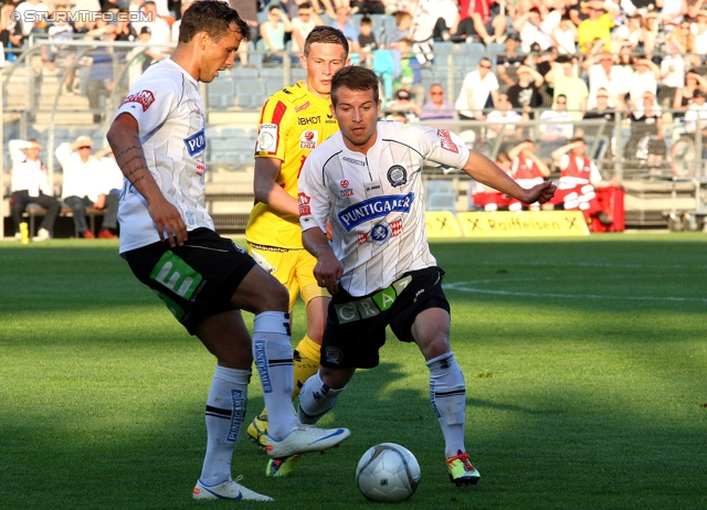 Sturm Graz - Kapfenberg
Oesterreichische Fussball Bundesliga, 32. Runde,  SK Sturm Graz - Kapfenberger SV 1919, Stadion Liebenau Graz, 28.04.2012. 

Foto zeigt Haris Bukva (Sturm) und Christoph Kroepfl (Sturm)
