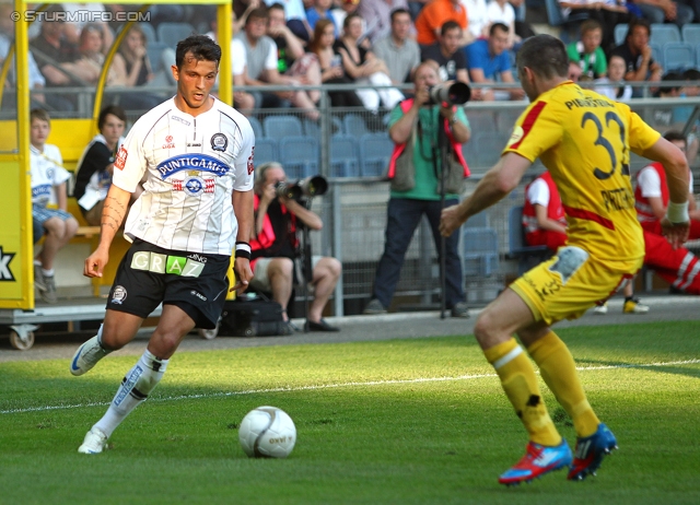 Sturm Graz - Kapfenberg
Oesterreichische Fussball Bundesliga, 32. Runde,  SK Sturm Graz - Kapfenberger SV 1919, Stadion Liebenau Graz, 28.04.2012. 

Foto zeigt Haris Bukva (Sturm) und Mark Prettenthaler (Kapfenberg)
