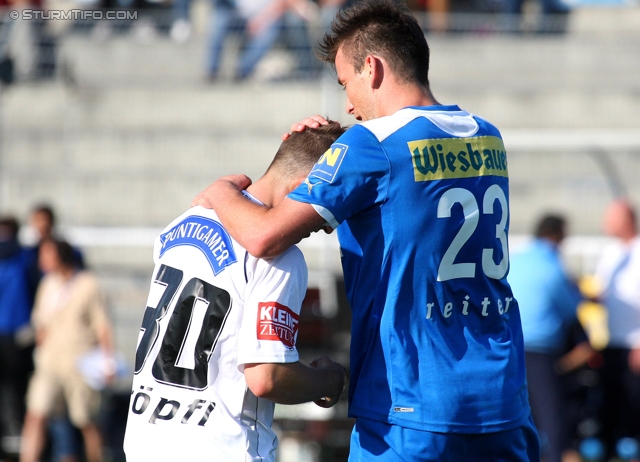 Wr. Neustadt - Sturm Graz
Oesterreichische Fussball Bundesliga, 33. Runde,  SC Wiener Neustadt - SK Sturm Graz, Stadion Wiener Neustadt, 05.05.2012. 

Foto zeigt Christoph Kroepfl (Sturm) und Mario Reiter (Wr. Neustadt)
