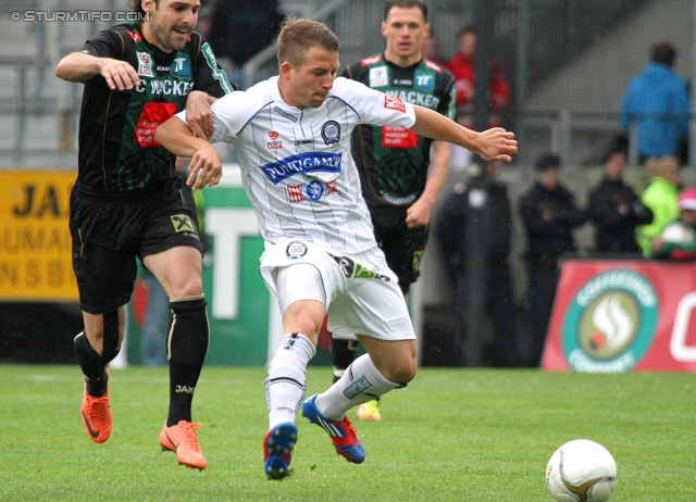 Innsbruck - Sturm Graz
Oesterreichische Fussball Bundesliga, 35. Runde,  Wacker Innsbruck - SK Sturm Graz, Tivoli Stadion Innsbruck, 13.05.2012. 

Foto zeigt Christoph Kroepfl (Sturm)
