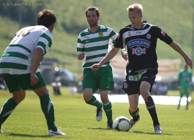 St. Margarethen - Sturm Graz
Testspiel, SC St. Margarethen a. d. Raab - SK Sturm Graz, Edi-Glieder-Stadion St. Margarethen a. d. Raab, 17.06.2012. 

Foto zeigt Markus Brottrager (St. Margarethen) und Matthias Koch (Sturm)
