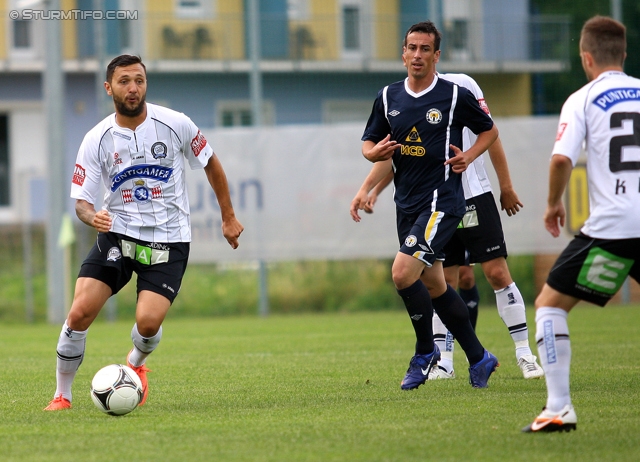 Sturm Graz - Metalurg Donezk
Testspiel, SK Sturm Graz - Metalurg Donezk, Sporzentrum Unterpremstaetten, 23.06.2012. 

Foto zeigt Darko Bodul (Sturm) und Christian Klem (Sturm)
