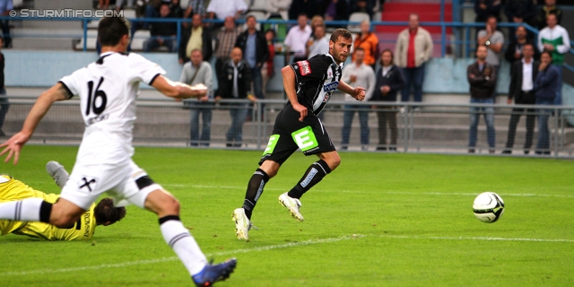 Wattens - Sturm Graz
OEFB Cup, 1. Runde, WSG Wattens - SK Sturm Graz, Alpenstadion Wattens, 13.07.2012. 

Foto zeigt Florian Buchacher (Wattens) und Juergen Saeumel (Sturm)
Schlüsselwörter: tor