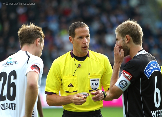 Sturm Graz - Wolfsberg
Oesterreichische Fussball Bundesliga, 4. Runde, SK Sturm Graz - Wolfsberger AC, Stadion Liebenau Graz, 11.08.2012. 

Foto zeigt Michael Sollbauer (Wolfsberg), Schiedsrichter Robert Schoergenhofer und Manuel Weber (Sturm)
