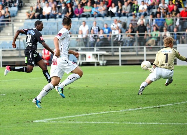 Sturm Graz - Wolfsberg
Oesterreichische Fussball Bundesliga, 4. Runde, SK Sturm Graz - Wolfsberger AC, Stadion Liebenau Graz, 11.08.2012. 

Foto zeigt Richard Sukuta-Pasu (Sturm) und Christian Dobnik (Wolfsberg)
