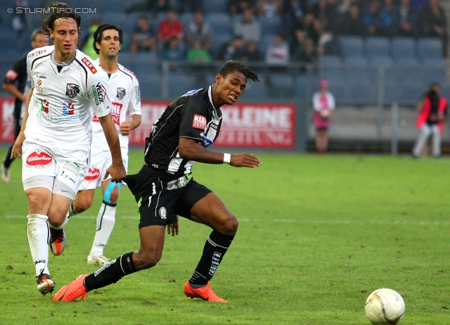 Sturm Graz - Wolfsberg
Oesterreichische Fussball Bundesliga, 4. Runde, SK Sturm Graz - Wolfsberger AC, Stadion Liebenau Graz, 11.08.2012. 

Foto zeigt Dario Baldauf (Wolfsberg) und Rubin Rafael Okotie (Sturm)
