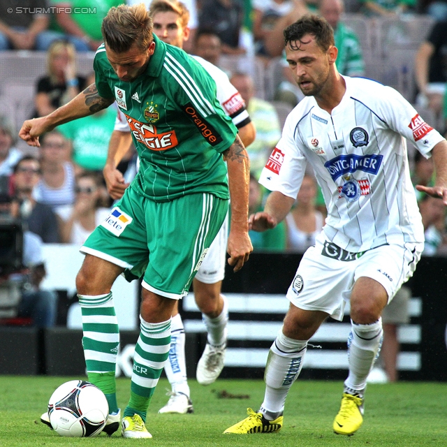 Rapid Wien - Sturm Graz
Oesterreichische Fussball Bundesliga, 5. Runde, SK Rapid Wien - SK Sturm Graz, Gerhard-Hanappi-Stadion Wien, 18.08.2012. 

Foto zeigt Guido Burgstaller (Rapid) und Michael Madl (Sturm)
