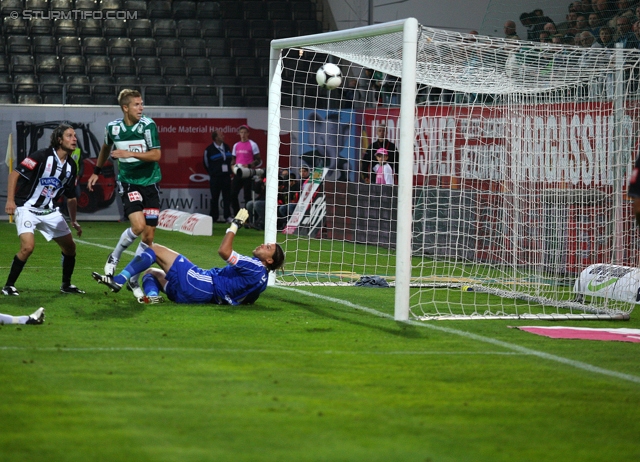 Ried - Sturm Graz
Oesterreichische Fussball Bundesliga, 7. Runde, SV Ried - SK Sturm Graz, Arena Ried, 01.09.2012. 

Foto zeigt Imre Szabics (Sturm) und Thomas Gebauer (Ried)
