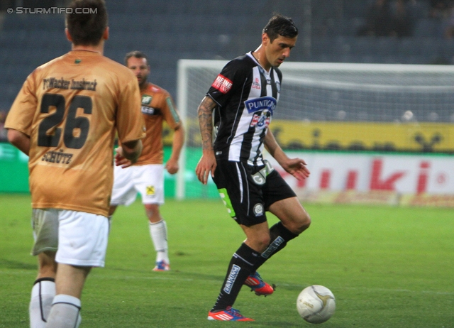 Sturm Graz - Innsbruck
Oesterreichische Fussball Bundesliga, 8. Runde, SK Sturm Graz - FC Wacker Innsbruck, Stadion Liebenau Graz, 15.09.2012. 

Foto zeigt Daniel Schuetz (Innsbruck) und Nikola Vujadinovic (Sturm)
