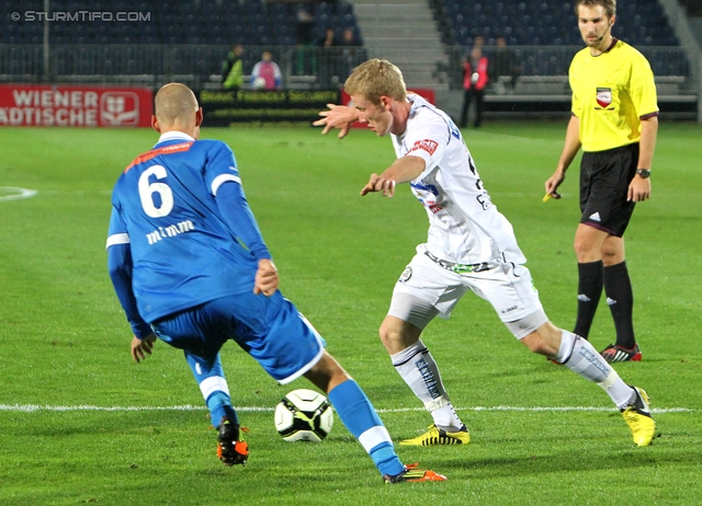 Wr. Neustadt - Sturm Graz
Oesterreichische Fussball Bundesliga, 9. Runde,  SC Wiener Neustadt - SK Sturm Graz,Stadion Wiener Neustadt, 22.05.2012. 

Foto zeigt Denis Mimm (Wr. Neustadt) und Florian Kainz (Sturm)
