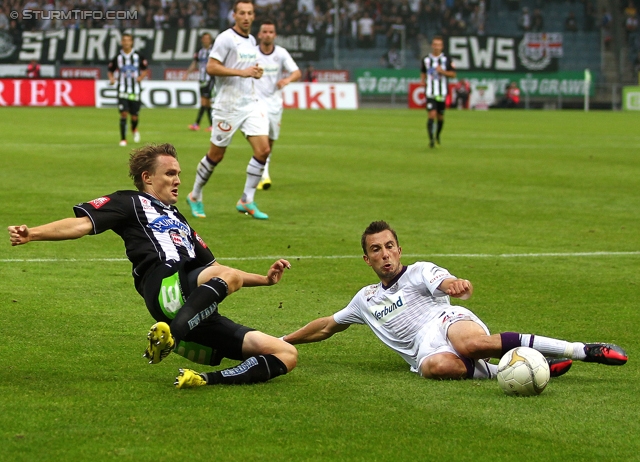 Sturm Graz - Austria Wien
Oesterreichische Fussball Bundesliga, 11. Runde, SK Sturm Graz - FK Austria Wien, Stadion Liebenau Graz, 07.10.2012. 

Foto zeigt Andreas Hoelzl (Sturm) und Lukas Rotpuller (Austria)
